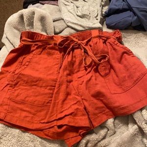 Burnt orange shorts, perfect for a summer day.
